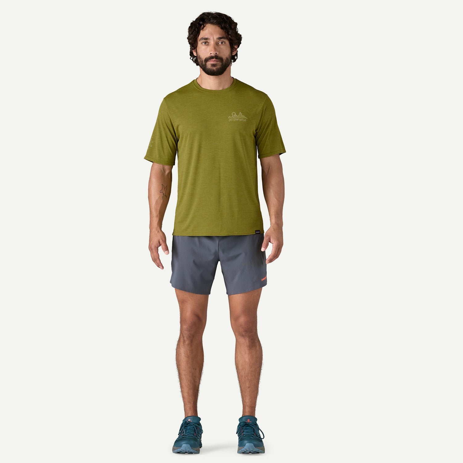 Men's Cap Cool Daily Graphic T-shirt - Lands WIND RUNNER: GRAZE GREEN X-DYE / XS